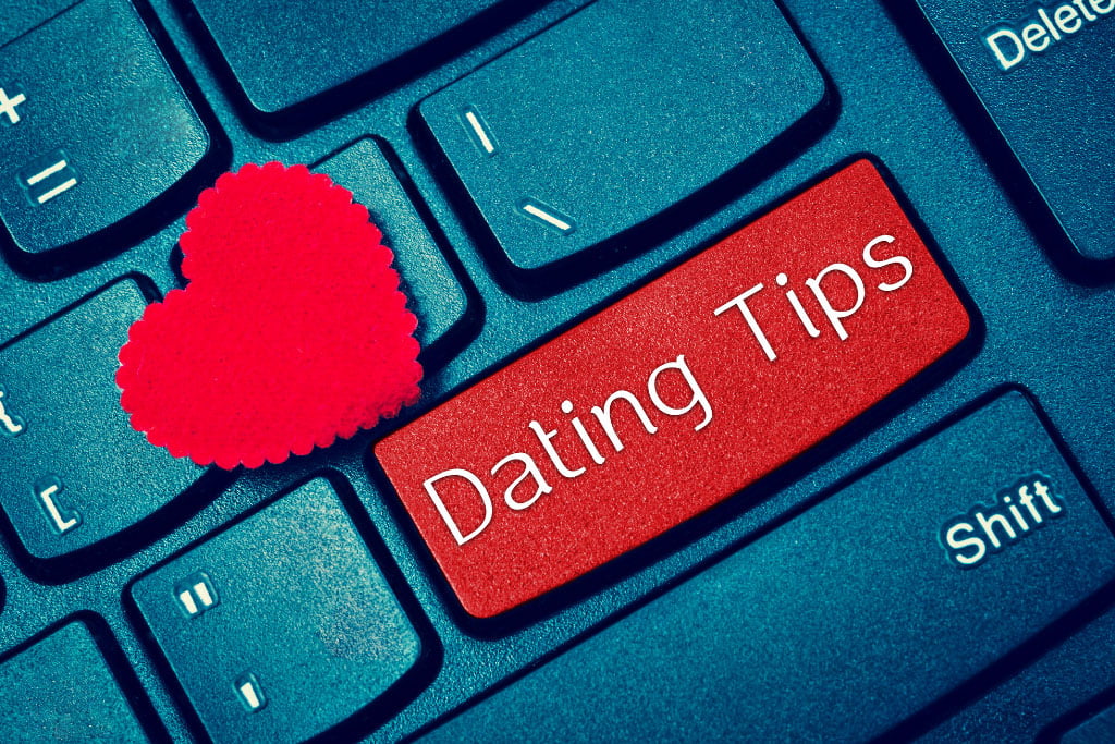 Dating tips on a laptop keyboard
