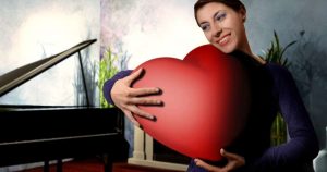 women with a fall in love heart