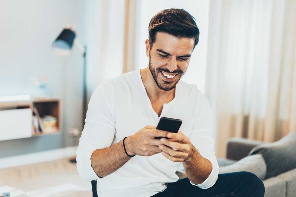 Man reading text massage