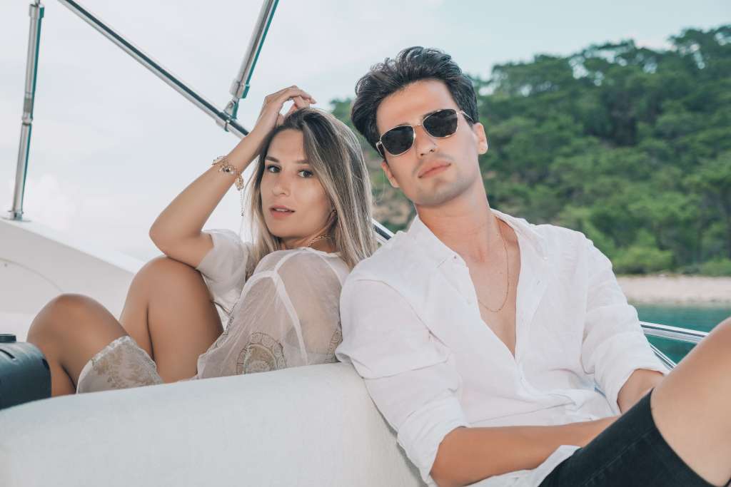 A young man and woman relaxing