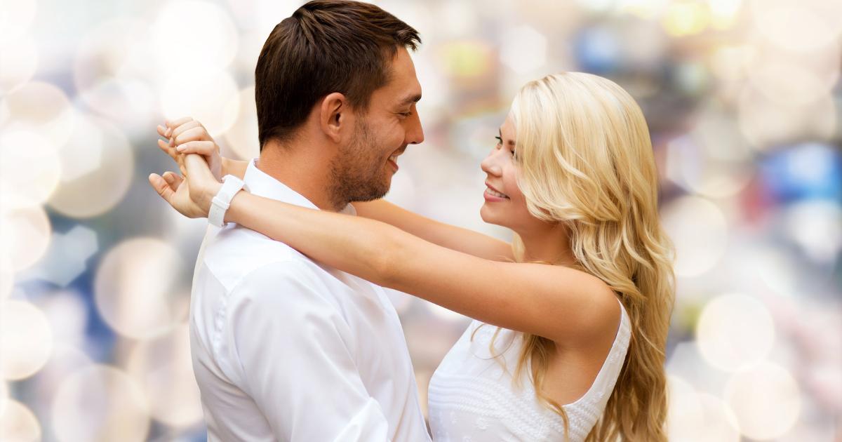 A happy couple in love embracing each other