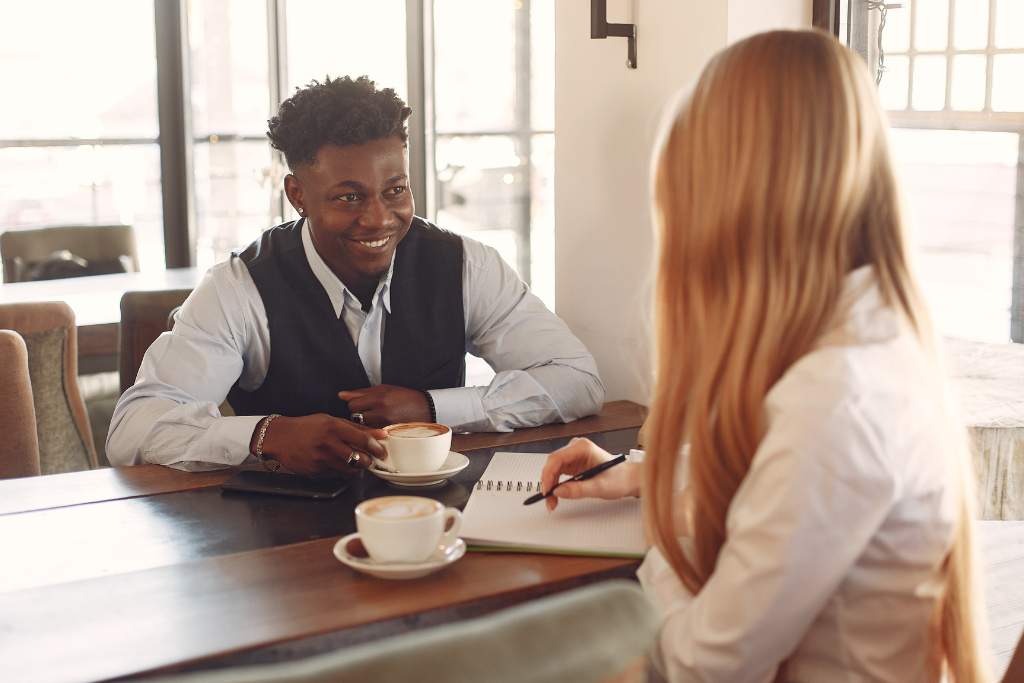 Two people making eye contact and smiling