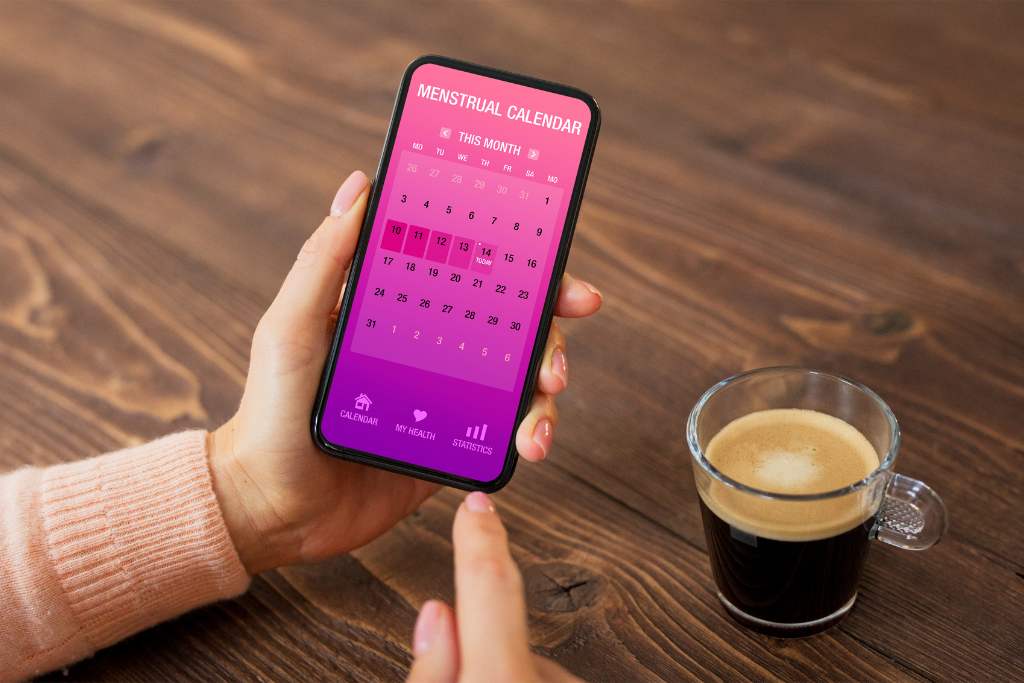 A smartphone screen displaying a couple's calendar with shared events and reminders, showcasing the digital tools discussed in this section of the article that can help couples enhance their relationships by staying organized and communicating effectively.